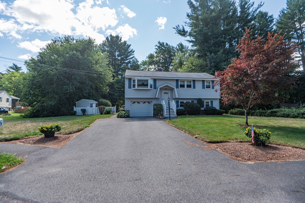 16 Freddy Road Billerica, MA 01821 - Photo 2 of 27 a front view of house with yard and green space