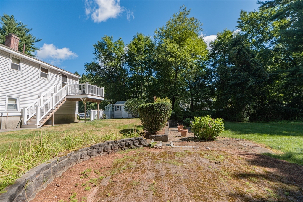 16 Freddy Road Billerica, MA 01821 - Photo 23 of 27 a view of a house with backyard and sitting area