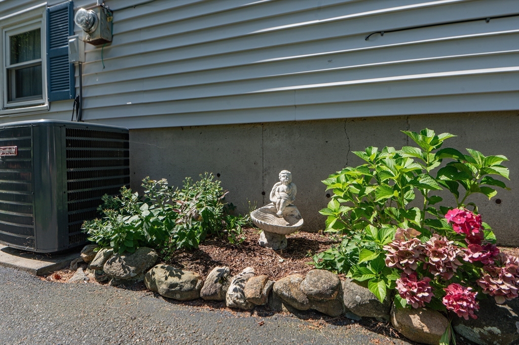 16 Freddy Road Billerica, MA 01821 - Photo 4 of 27 a front view of a house with a yard