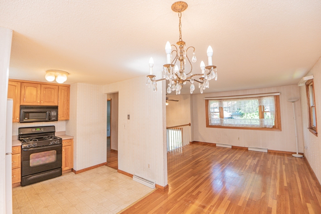 16 Freddy Road Billerica, MA 01821 - Photo 10 of 27 a view of a livingroom with a chandelier