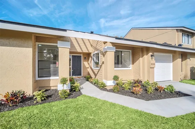 front view of a house with a yard