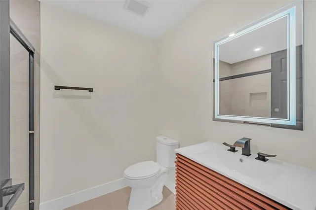 a bathroom with a sink and a toilet