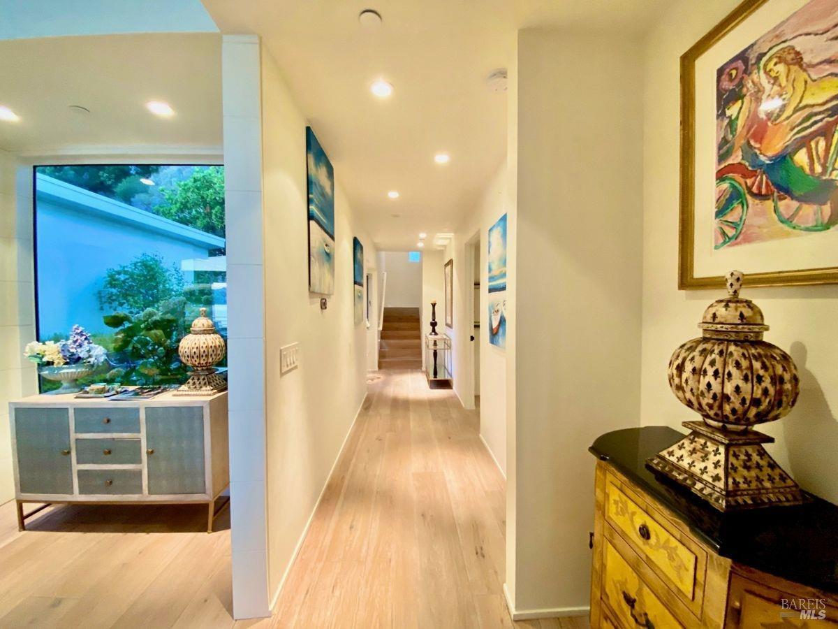 55 West Shore Road Belvedere, CA 94920 - Photo 12 of 16 a view of a hallway to a livingroom with furniture