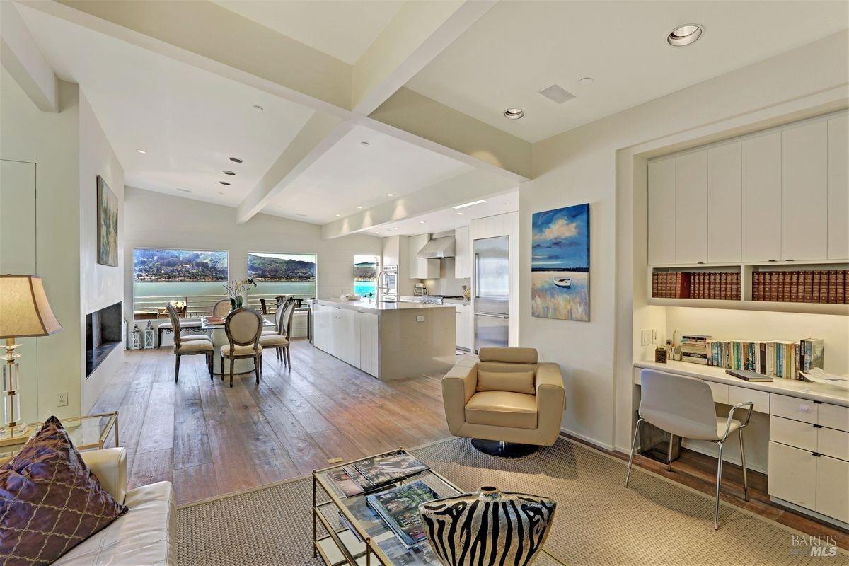 55 West Shore Road Belvedere, CA 94920 - Photo 6 of 16 a living room with furniture and a book shelf
