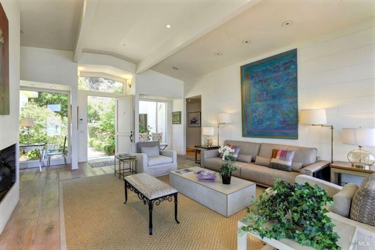 55 West Shore Road Belvedere, CA 94920 - Photo 8 of 16 a living room with furniture and a large window