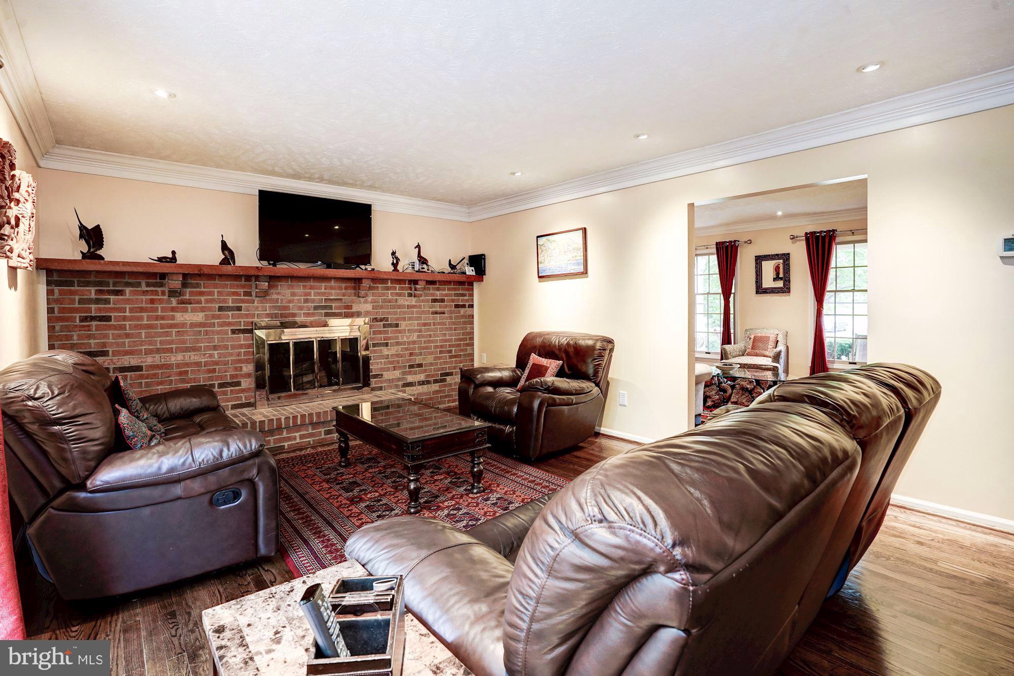 2330 Club Pond Lane Reston, VA 20191 - Photo 17 of 39 Family Room- Brick Wood Burning Fireplace