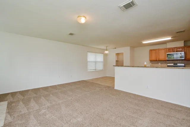 a view of a kitchen and a dishwasher cabinets