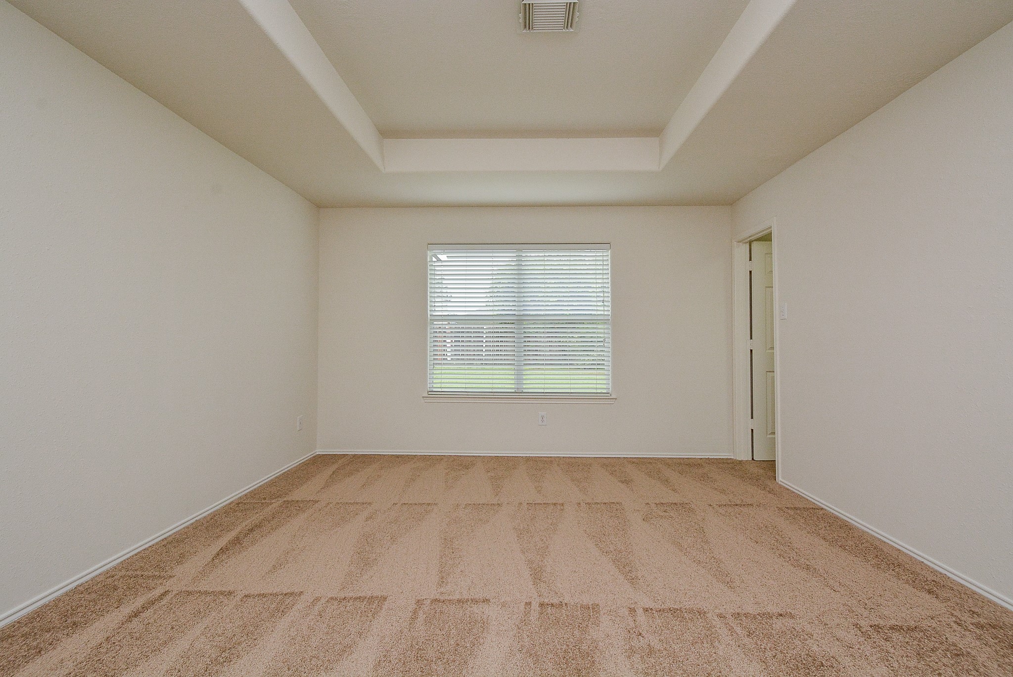 18326 Thicket Grove Road Houston, TX 77084 - Photo 21 of 50 an empty room with a empty space and windows