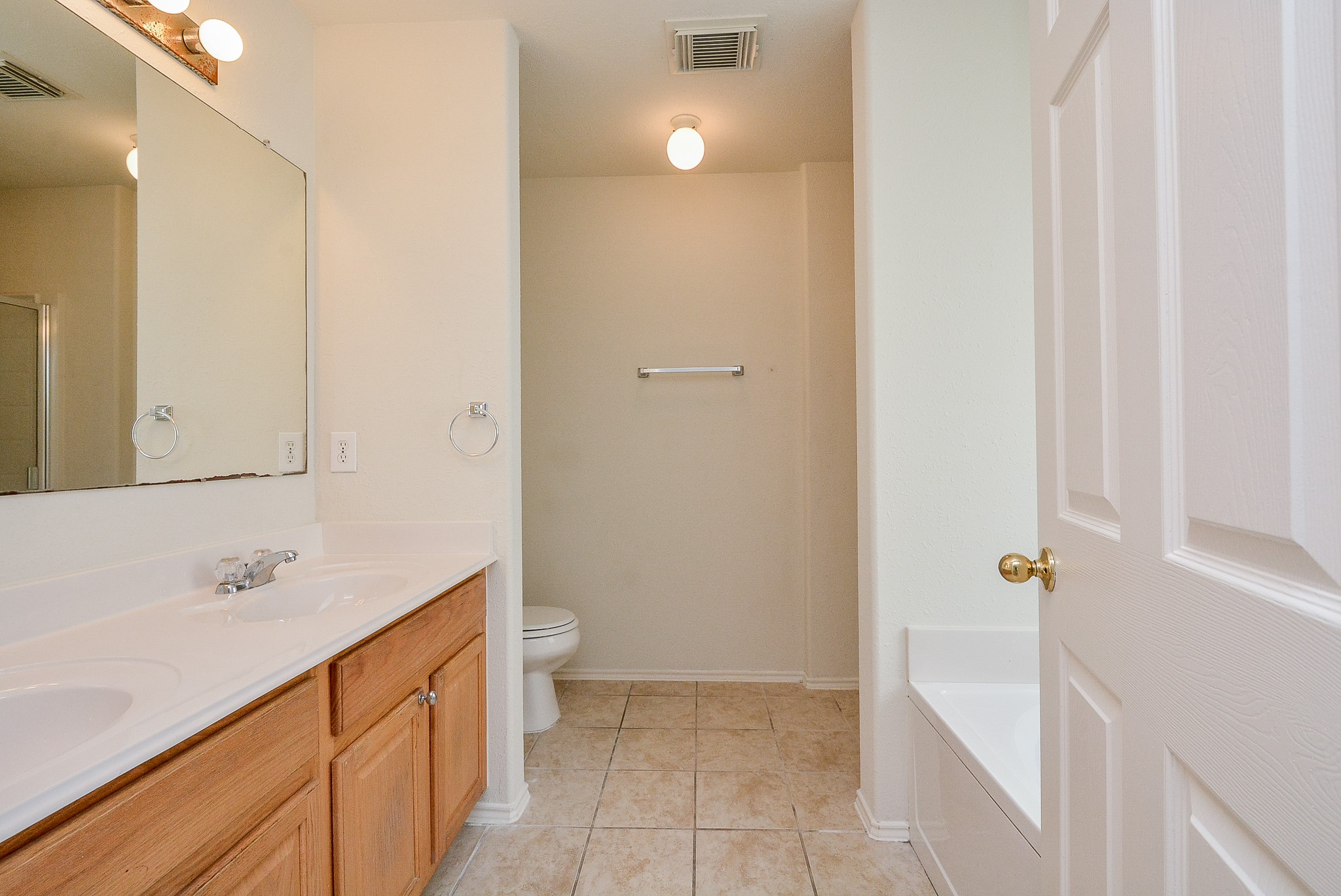 18326 Thicket Grove Road Houston, TX 77084 - Photo 26 of 50 a bathroom with a sink a toilet and shower