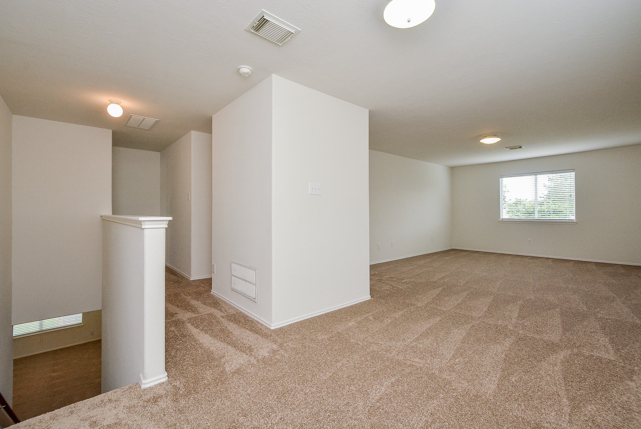 18326 Thicket Grove Road Houston, TX 77084 - Photo 27 of 50 a view of an empty room with a window