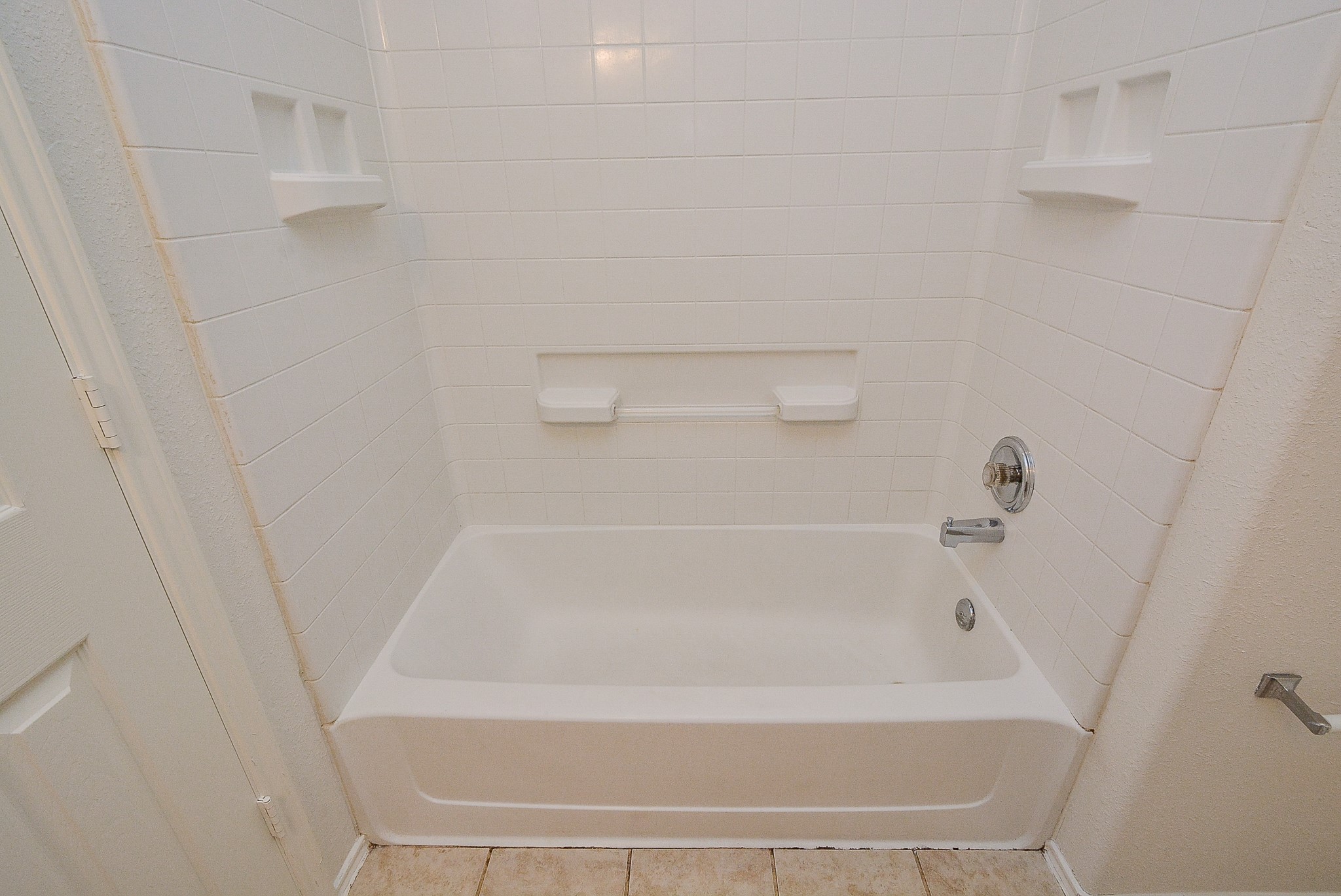 18326 Thicket Grove Road Houston, TX 77084 - Photo 34 of 50 a close up of a bathtub in a bathroom