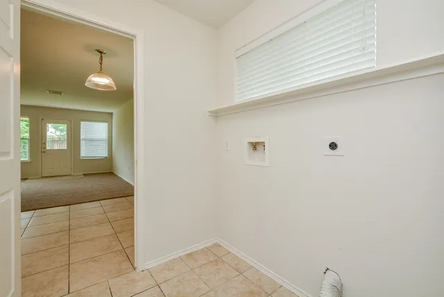 a view of small space with racks on the wall