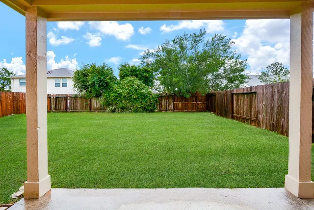 a view of a porch with a backyard