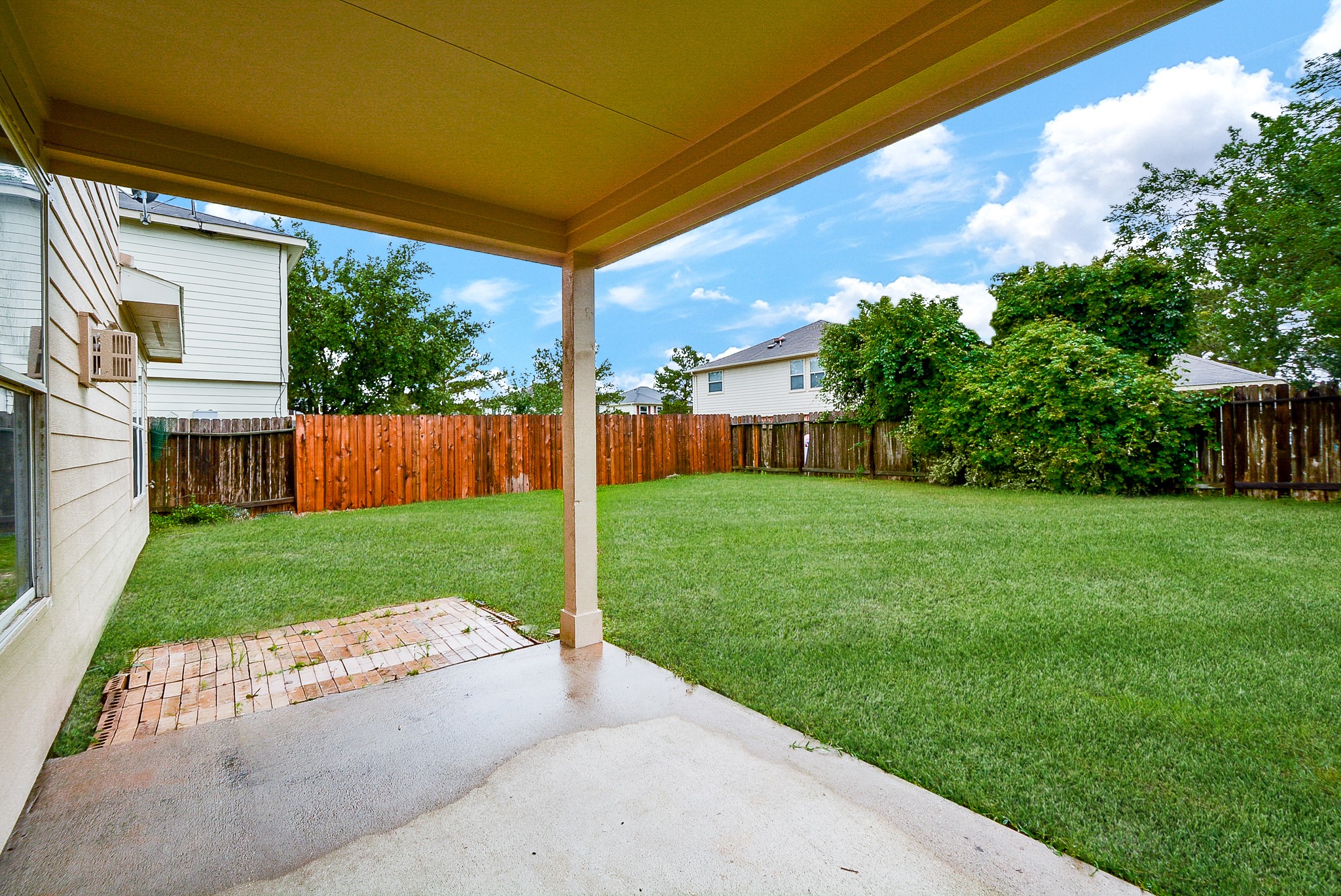 18326 Thicket Grove Road Houston, TX 77084 - Photo 45 of 50 a view of a porch with a backyard