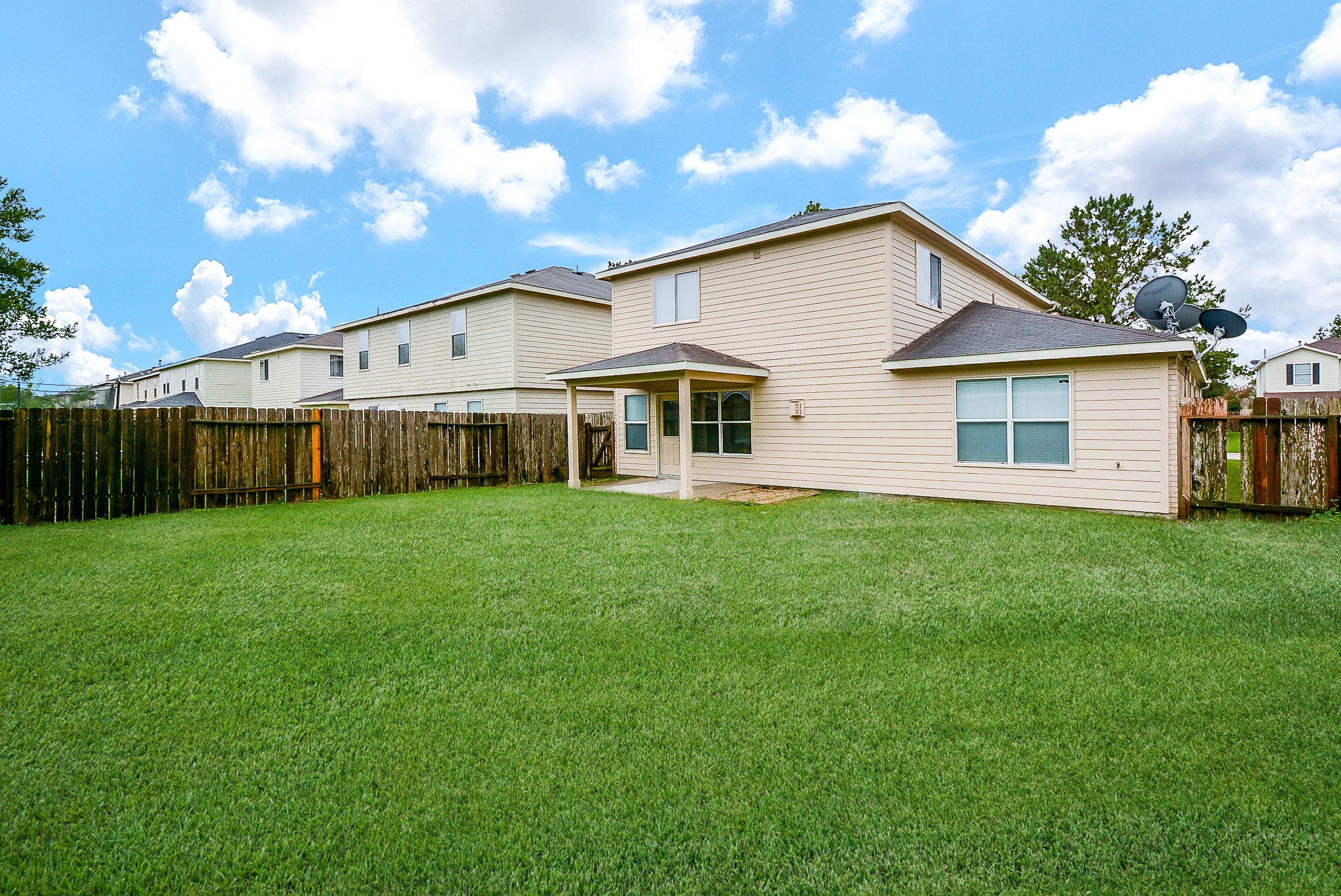 18326 Thicket Grove Road Houston, TX 77084 - Photo 49 of 50 a view of a house with a yard