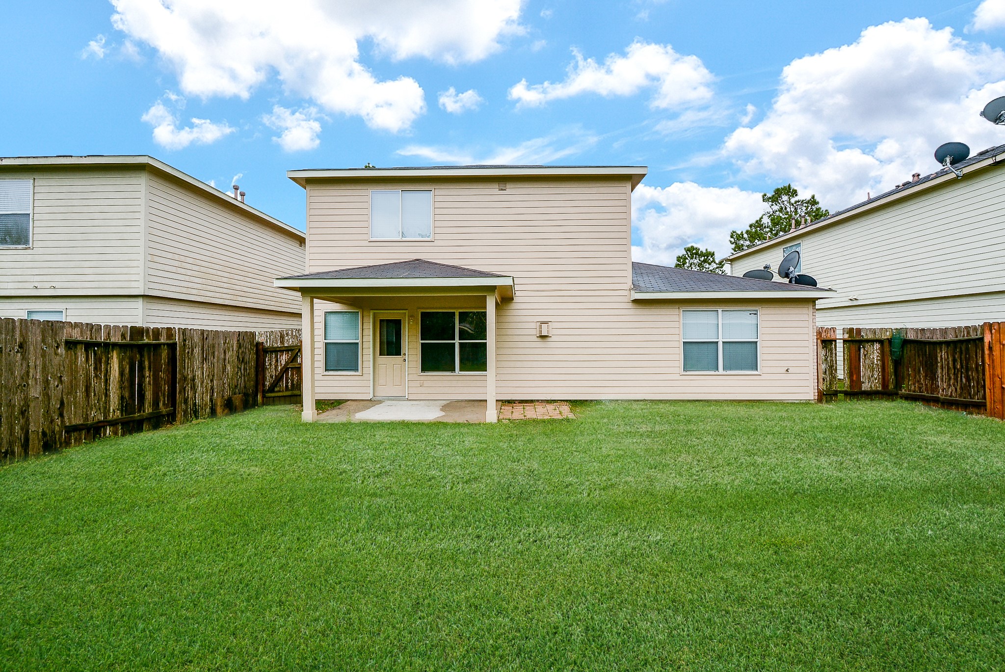 18326 Thicket Grove Road Houston, TX 77084 - Photo 50 of 50 a view of a house with a backyard