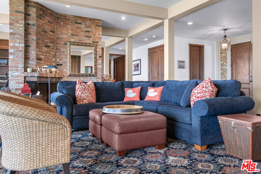 29008 Cliffside Drive Malibu, CA 90265 - Photo 14 of 28 a living room with furniture and a couch