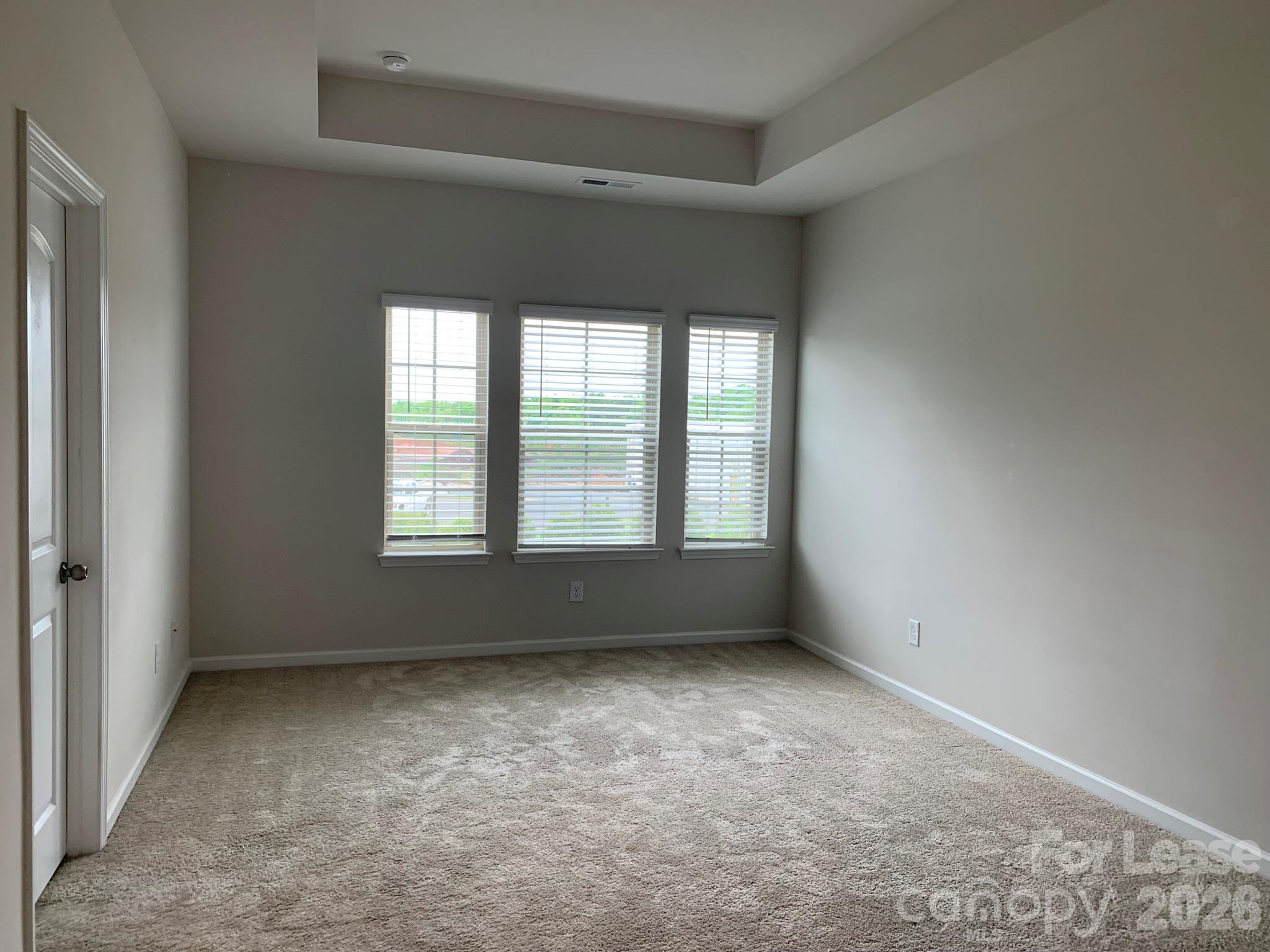 2143 Stevens Mill Road Matthews, NC 28104 - Photo 17 of 39 an empty room with a window