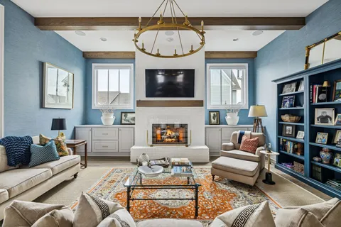 a spacious bedroom with a bed and a table