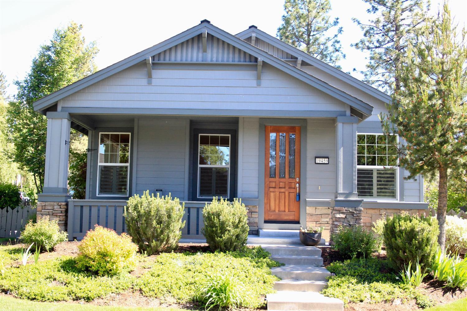 19459 Blue Lake Loop Bend, OR 97702 - Photo 2 of 19 a front view of a house with a yard