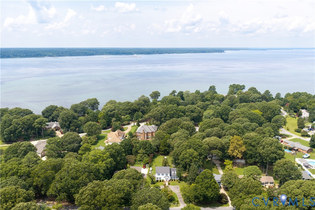 1760 Gloucester Road Gloucester Point, VA 23062 - Photo 50 of 52 Expansive water body bordering a verdant, treed la