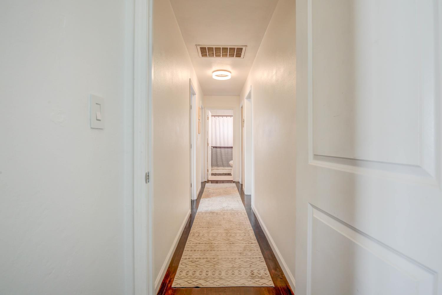 1424 Kitchner Road Sacramento, CA 95822 - Photo 13 of 28 Hallway facing bathroom