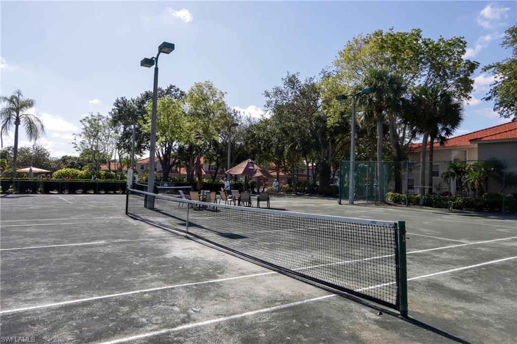 2585 Old Groves Road, Unit L203 Naples, FL 34109 - Photo 20 of 21 View of tennis court