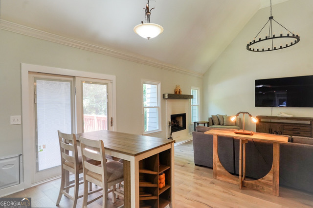 335 Butterfield Lane Fayetteville, GA 30214 - Photo 5 of 27 a view of a dining room with furniture window and wooden floor