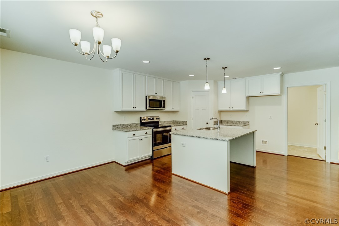 7301 Appelman Road Chesterfield, VA 23832 - Photo 3 of 14 a kitchen with a sink stainless steel appliances and cabinets