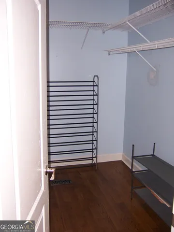 a view of a room with racks on the wall