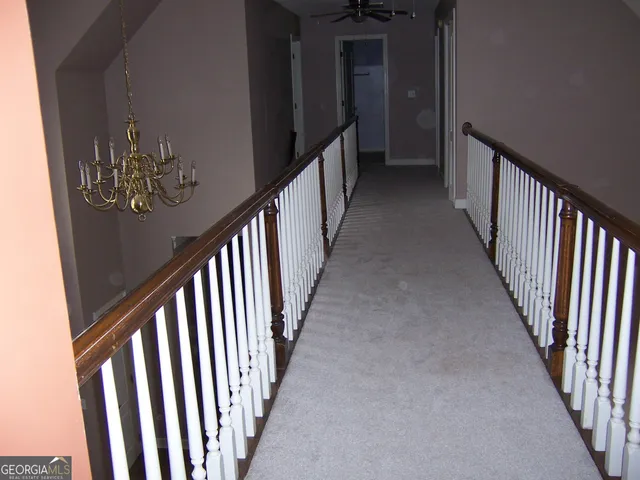 a view of a stairs and an entryway
