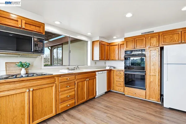 a living room with furniture and window