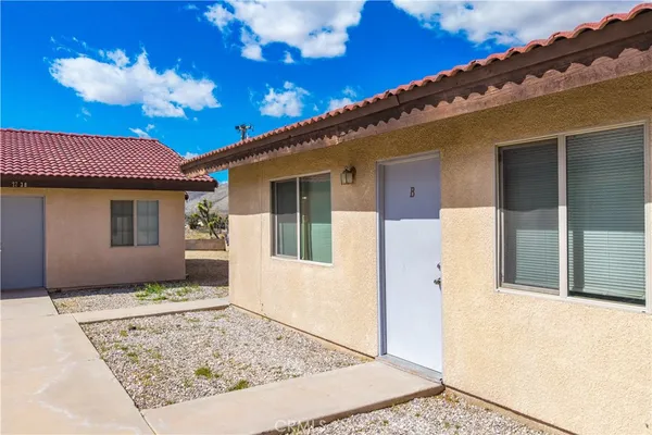 a view of a room with a table and chair