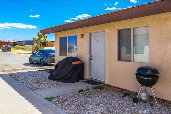 a house with yard in front of it