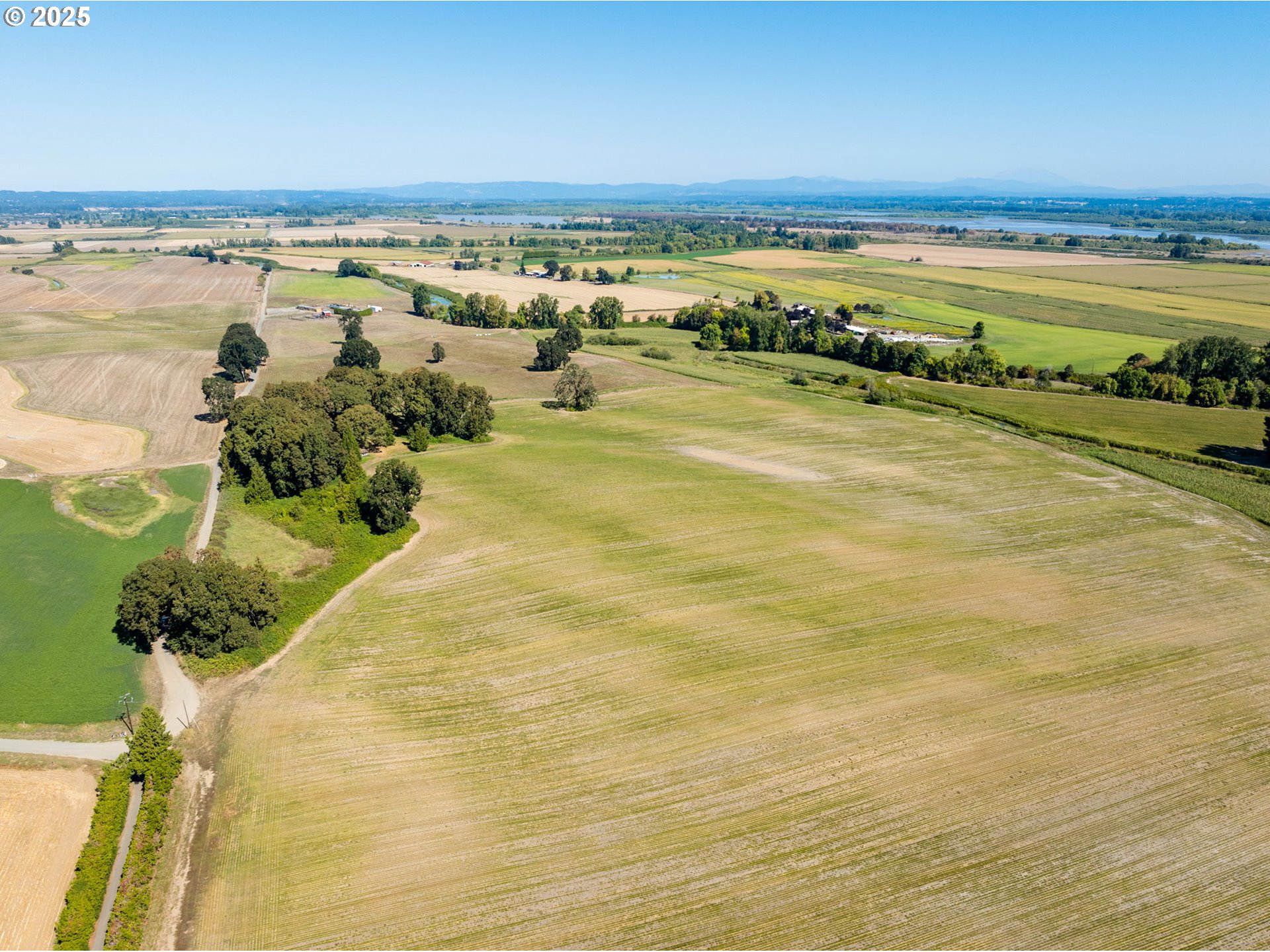 Northwest Lucy Reeder Road Portland, OR 97231 - Photo 5 of 17 a view of an ocean and beach