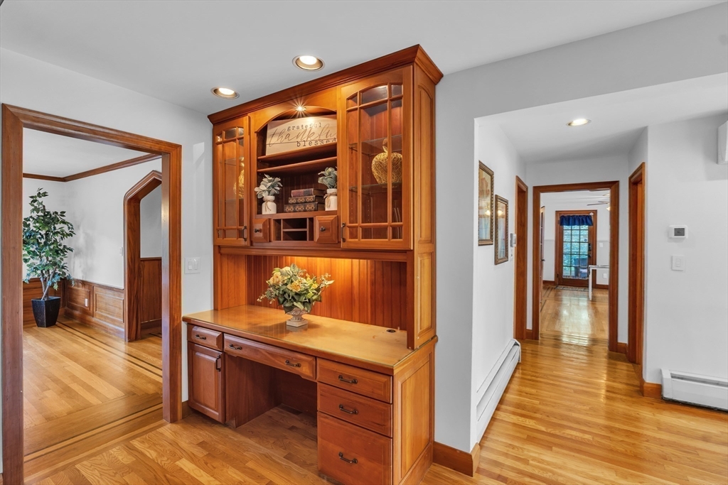 493 Salisbury Street Worcester, MA 01609 - Photo 14 of 42 a room with wooden floor and furniture