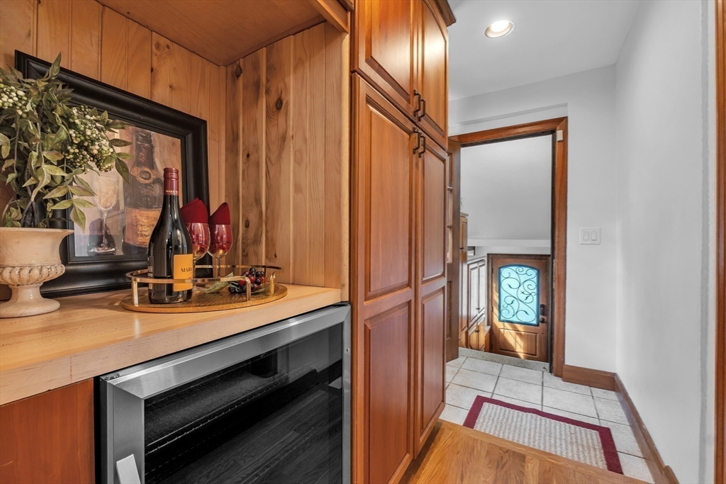 493 Salisbury Street Worcester, MA 01609 - Photo 17 of 42 a view of a hallway with washer and dryer