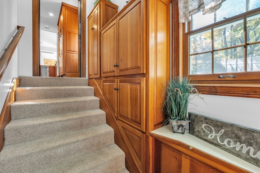 493 Salisbury Street Worcester, MA 01609 - Photo 18 of 42 a view of staircase with open kitchen view