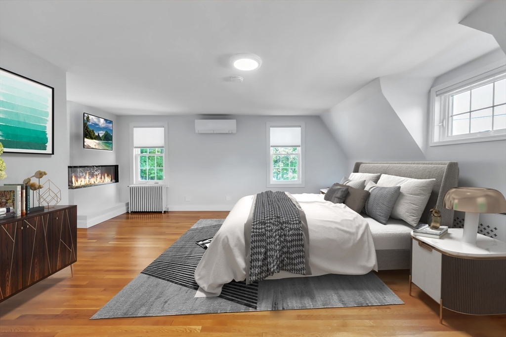 493 Salisbury Street Worcester, MA 01609 - Photo 33 of 42 a living room with furniture and a flat screen tv