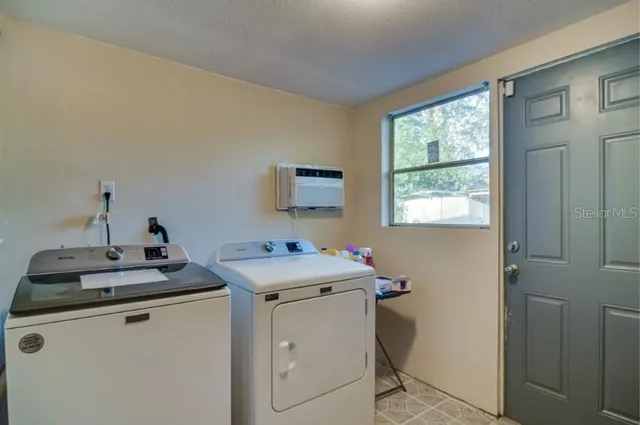 a sink sitting next to a window