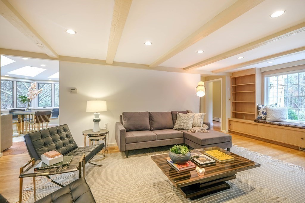 73 Draper Road Wayland, MA 01778 - Photo 2 of 13 a living room with furniture and a large window