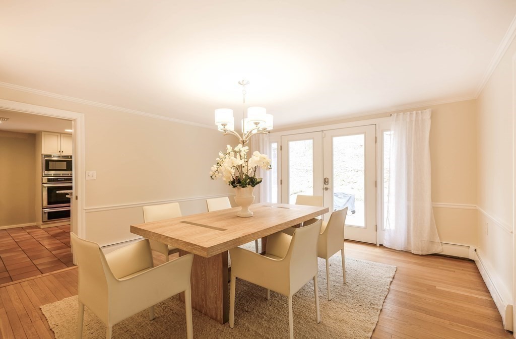 73 Draper Road Wayland, MA 01778 - Photo 5 of 13 a dining room with furniture and window