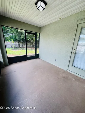 a house with swimming pool in front of it