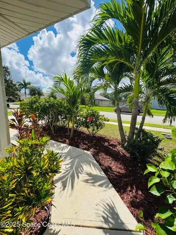 a kitchen with stainless steel appliances granite countertop a sink and a stove
