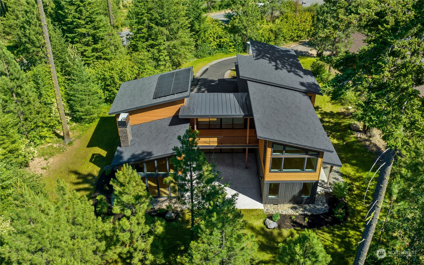 21 Kokanee Loop Cle Elum, WA 98922 - Photo 32 of 35 an aerial view of a house with a yard and large trees