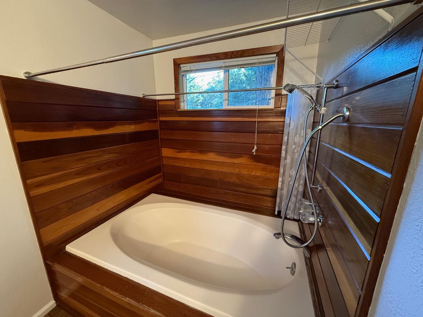 252 Swett Road Woodside, CA 94062 - Photo 10 of 21 a bathroom with a tub and shower
