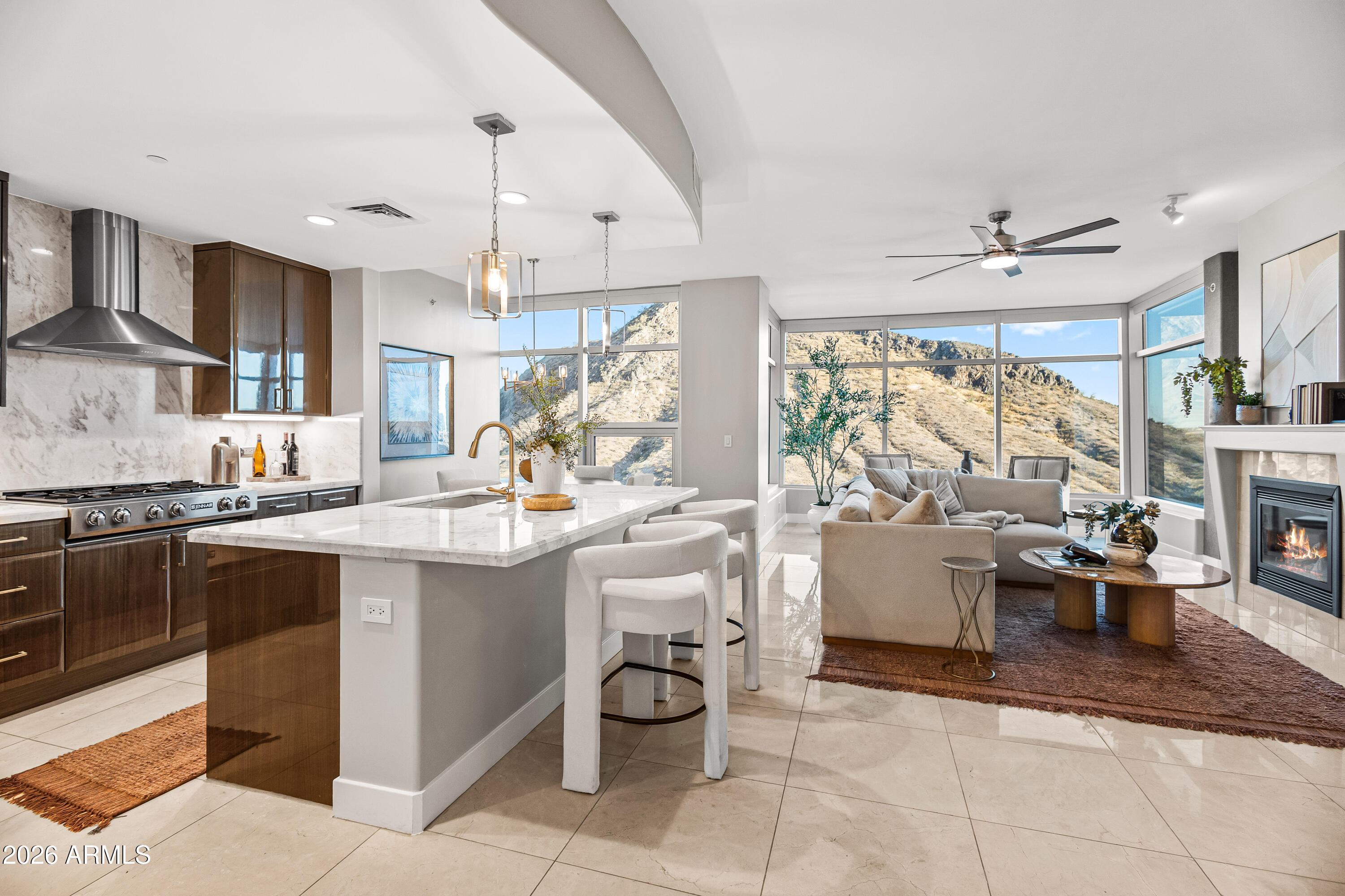 140 East Rio Salado Parkway, Unit 1101 Tempe, AZ 85281 - Photo 3 of 32 a kitchen with stainless steel appliances granite countertop a sink dishwasher a dining table and chairs with wooden floor