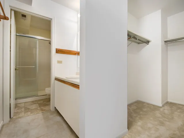 a view of a room with racks on the wall