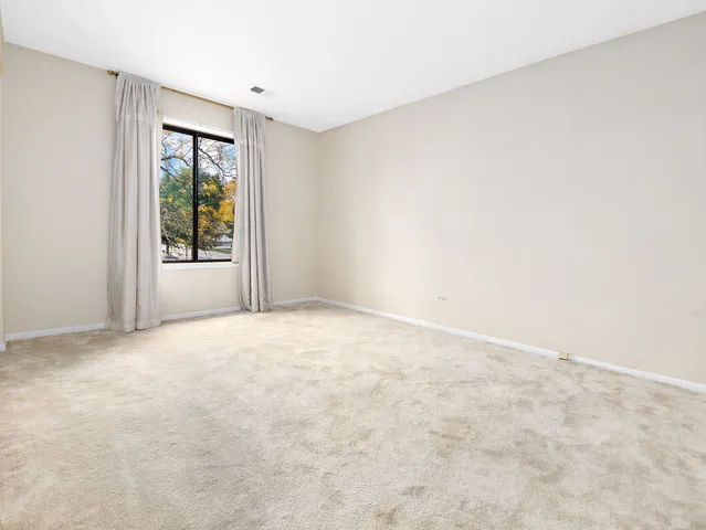 a view of storage and utility room with washer and dryer