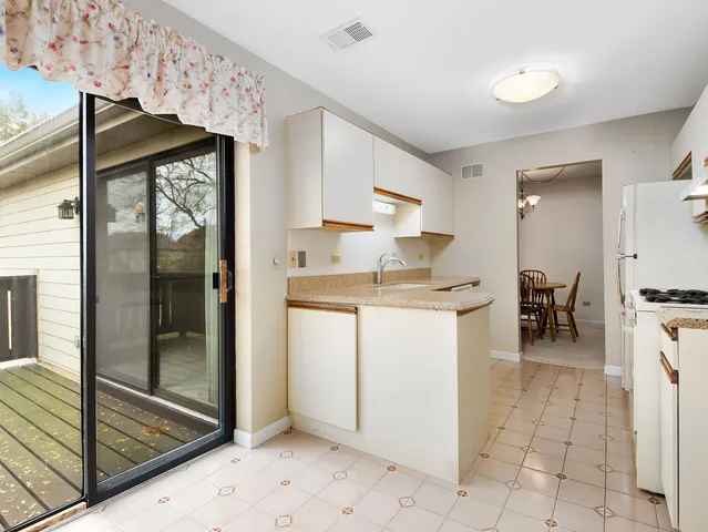 a view of a room with a large window